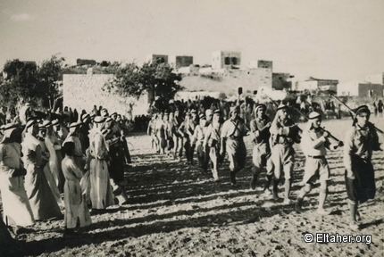 1936-1938 - Palestinian fighters parading in front of villagers 01